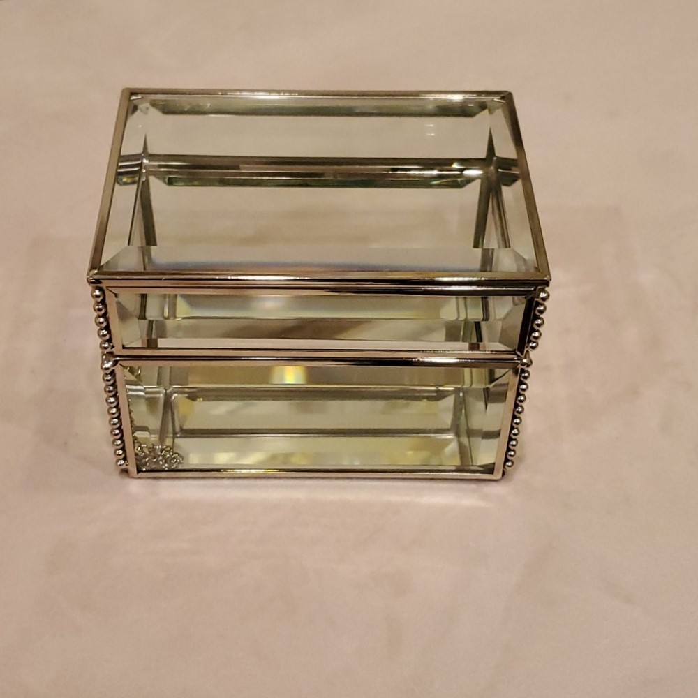 Max Studio glass jewelry box with mirrored bottom.